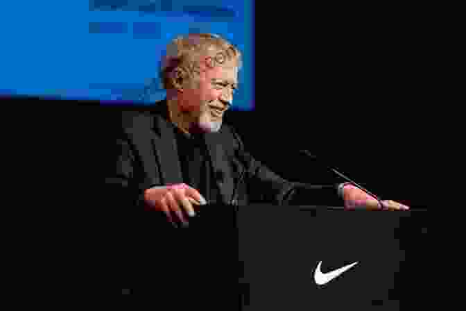 Phil Knight, The Visionary Founder Of Nike, Strikes A Contemplative Pose. A Joosr Guide To Shoe Dog By Phil Knight: A Memoir By The Creator Of NIKE